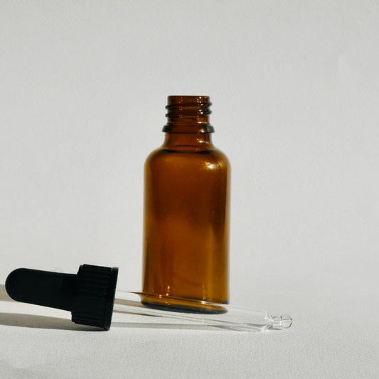 Flacon en verre ambré avec pipette pour produits cosmétiques